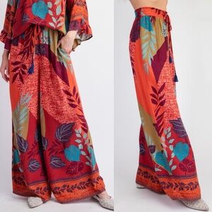NewEasel rust/olive border print patchwork floral flare wide leg palazzo pants